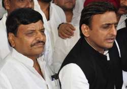 File - Akhilesh Yadav, Shivpal Singh speaking to media after a Cabinet meet