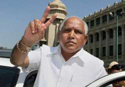 File pic - BS Yeddyurappa flashes victory sign outside Vidhana Soudha