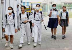 School girls wear anti-air pollution mask as pollution reached hazardous levels.