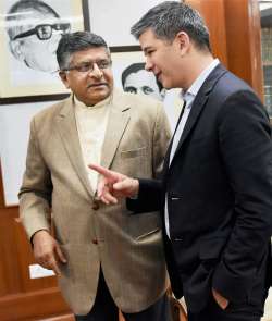 Uber CEO Travis Kalanick with Ravishankar Prasad