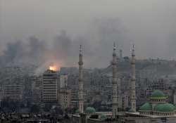 A ball of fire rises following an air strike hits insurgents in Aleppo