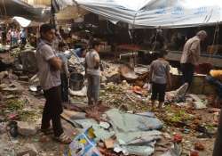 File pic - Damage in the al-Midan district of Damascus in August this year. 