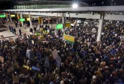 Protesters assemble at John F. Kennedy International Airport in New York