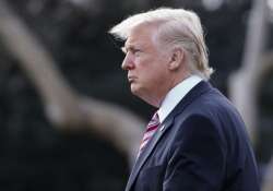 Donald Trump walks to board Marine One on the South Lawn of the White House