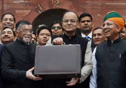 Jaitley stands outside his office at North Block