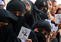 File pic - Women from minority community outside apolling booth 