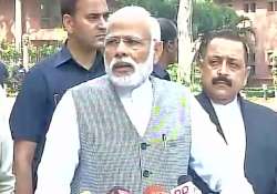 PM Narendra Modi speaks to reporters outside Parliament 