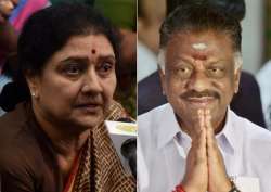 EC splits AIADMK into two, allots new party symbols