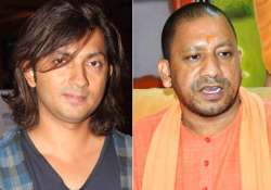 File pic - Shirish Kunder and Yogi Adityanath