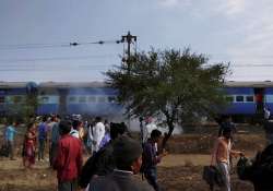 Smoke erupts from a bogie after a blast in the Bhopal-Ujjain passenger train 