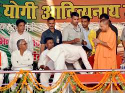 UP MLA Amanmani Tripathi touches feet of CM Yogi Adityanath