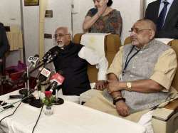 Hamid Ansari, Giriraj Singh addressing media onboard AI One Special Aircraft 