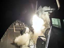 USS Ross (DDG 71) fires a tomahawk land attack missile from Mediterranean Sea
