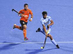 Pardeep keeps the ball off Malaysia's Firhan during Sultan Azlan Shah Cup