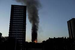 At least 6 dead as massive fire engulfs London's Grenfell Tower, several injured