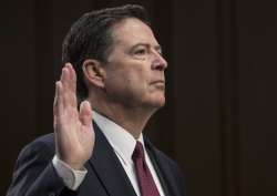 Comey is sworn in before Senate Select Committee on Intelligence on Capitol Hill