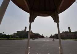 A view of roads at Vijay Chowk wearing almost deserted look during a hot day