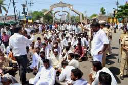 Farmers block the road during a protest in Solapur, Maharashtra