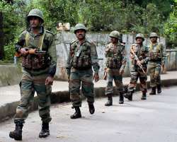 Army patrols a street following clashes between police and GJM supporters