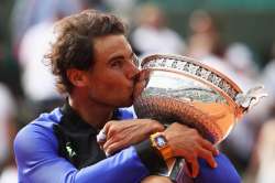 Rafael Nadal of Spain celebrates victory with the trophy