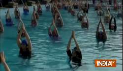 1000 women practice water yoga