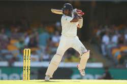 Cheteshwar Pujara of India plays a shot