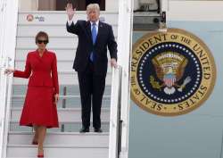 Donald Trump and FirstLady Melania arrive at Orly airport