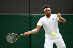 Jo-Wilfried Tsonga of France plays a forehand