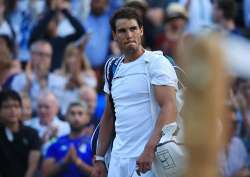 Rafael Nadal reacts after losing the match.