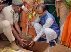 MP CM Shivraj Singh Chauhan with wife Shadhana at plantation drive