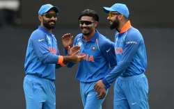 Ravindra Jadeja of India celebrates with Virat Kohli and Dinesh Karthik