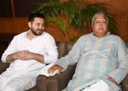 File pic - Tejashwi with his father Lalu Prasad Yadav 