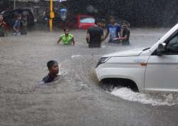 Videos: Heavy rainfall cripples normal life in Mumbai, several dead