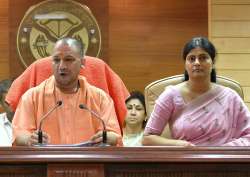 Lucknow: Yogi Aditiyanath, Anupriya Patel addressing a press conference