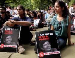 People protesting over the death of journalist Gauri Lankesh