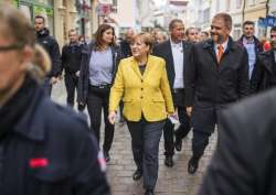 Angela Merkel takes a stroll through the old town of Stralsund