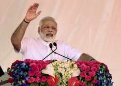 PM Modi addresses a gathering during Pradhanmantri Aawas Yojna in Varanasi 