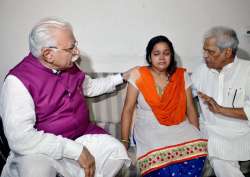 Manohar Lal Khattar consoling the mother of Pradyuman