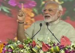 PM Narendra Modi addressing a rally in Rajkot 