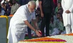 PM Narendra Modi pays floral tributes to Mahatma Gandhi at Rajghat