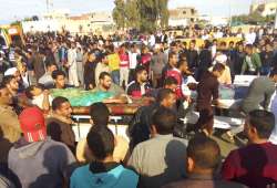 Injured people are evacuated from the scene of a militant attack on a mosque in Bir al-Abd in the northern Sinai Peninsula of Egypt on Friday, November 24, 2017. 