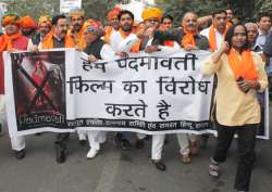 Members of Rajput community raise slogans and hold placards during the protest against upcoming Bollywood movie 'Padmavati'