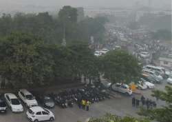 View of the Central Park at Rajiv Chowk, enveloped by heavy smog in New Delhi