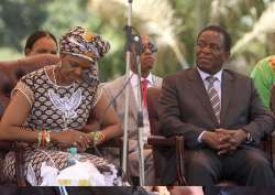 FILE - Zimbabwean first lady Grace Mugabe with Vice President Emmerson Mnangagwa at the Zanu pf headquarters in Harare