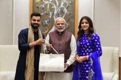 Newly-weds Virat Kohli, Anushka Sharma meet PM Narendra Modi; see pics