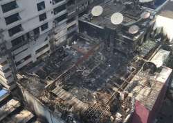 A view of the charred building in which a fire broke out in Mumbai on early Friday