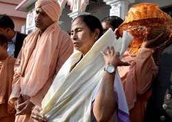 Mamata Banerjee comes out of Bharat Sevashram Sangha Temple after her visit, at Sagar Island 