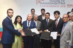 Maharashtra Chief Minister Devendra Fadnavis, State Industries Minister Subhash Desai and CEO of automobile manufacturers Lamborghini Tonino Lamborghini 
during an MoU signing ceremony at Magnetic Maharashtra Convergence 2018 in Mumbai on Monday. 