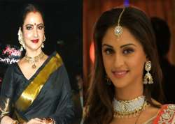 Krystle D'Souza, Rekha