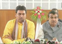 Biplab Deb with Union minister Nitin Gadkari. ANI photo